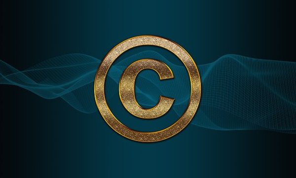 The letter C in a gold circle.