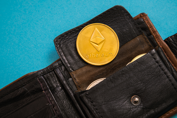 Gold coin with ethereum symbol.