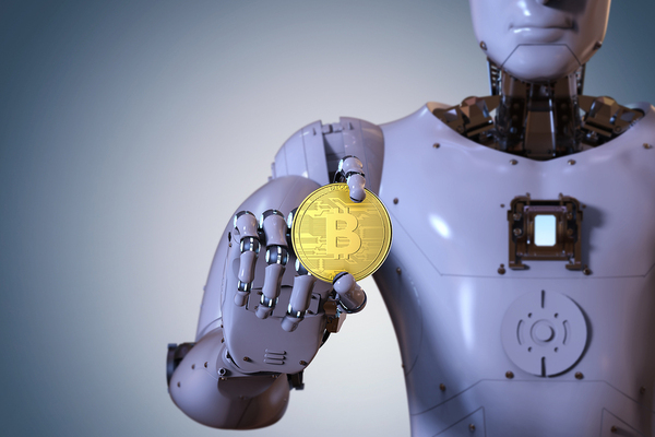 Robot holding a gold coin with bitcoin symbol.